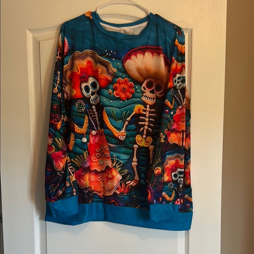 Super soft long sleeve sugar skull shirt. Brand new.